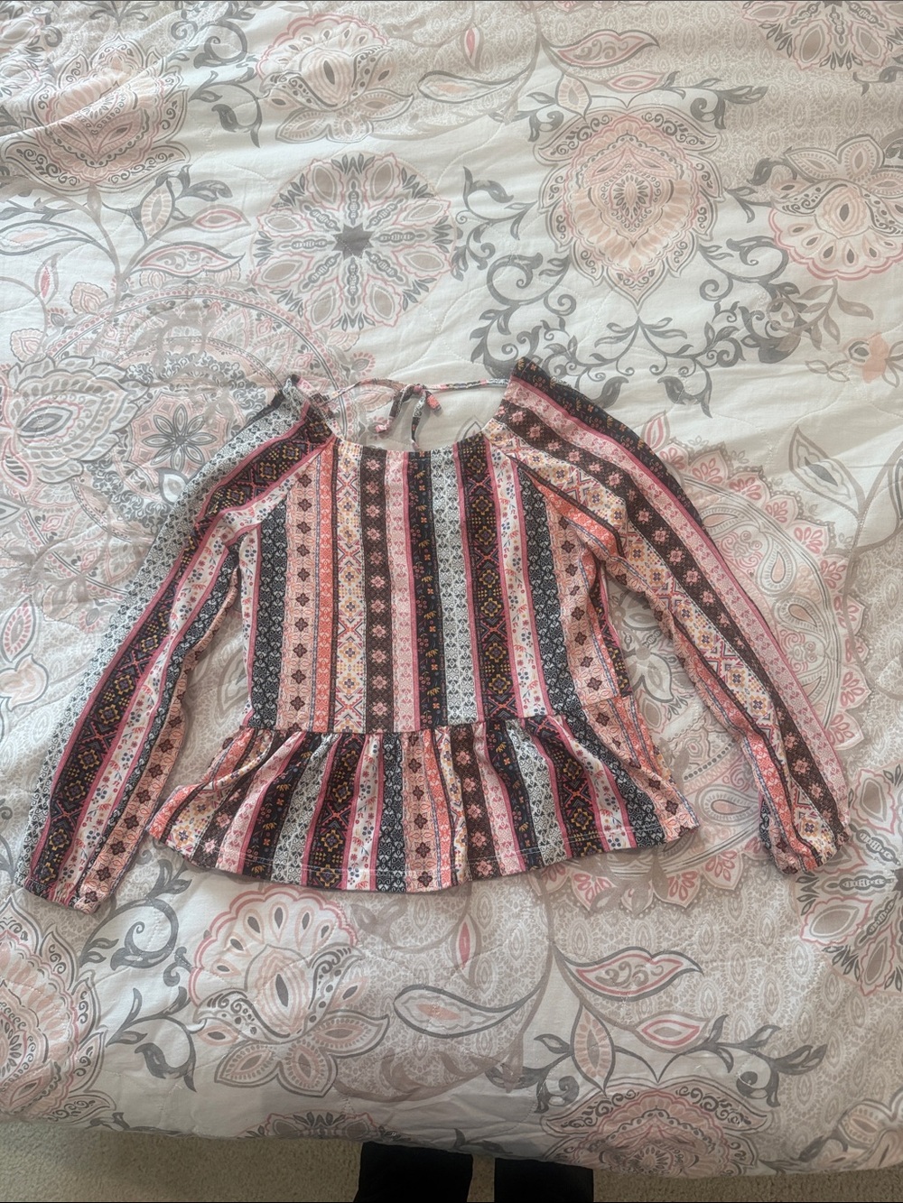 The Chic Petunia Striped Peplum Tunic in Pink, Black and Cream